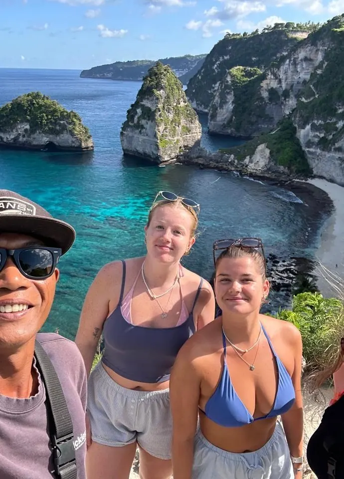 Gede with guests above the coves of Nusa Penida