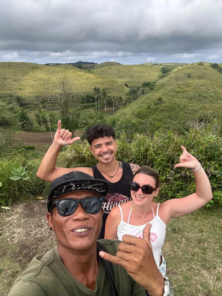 Gede with two guests at Teletubbies Hill